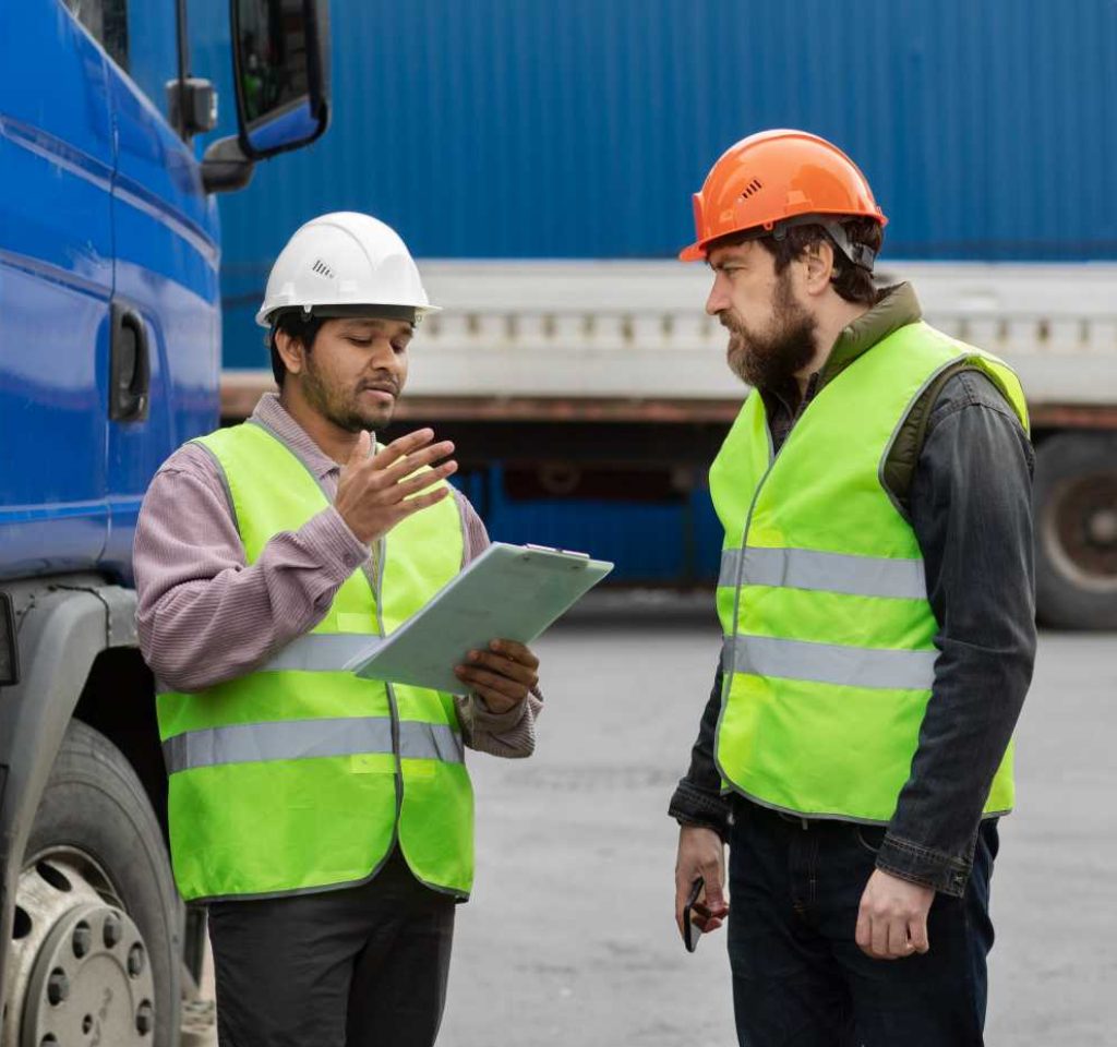 medium-shot-men-discussing-outdoors (1)